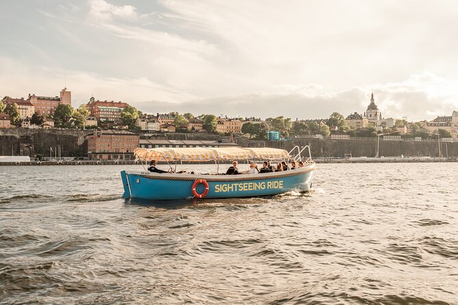 Open Electric Boat Ride in Stockholm with Live-Guide - Gröna Lund and Kastellholmen: fun contrast with history