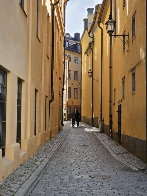 Stockholm: Secrets of Gamla Stan Guided Tour w/ Fika Option - A cannonball in the wall and St George’s Swedish legend