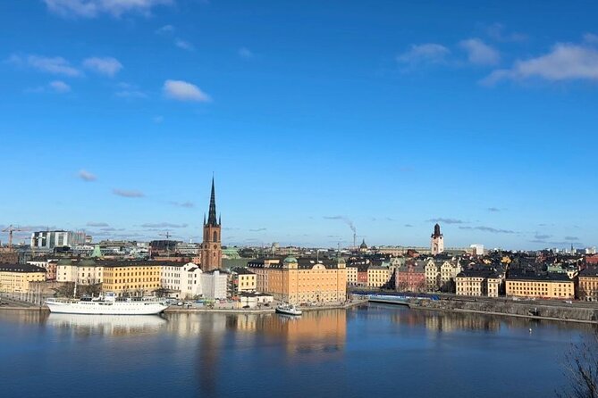 Stockholm Small Group Food Tour with 7 Classic Food Tastings - Walking toward Norrmalm on Drottninggatan: major pedestrian street energy