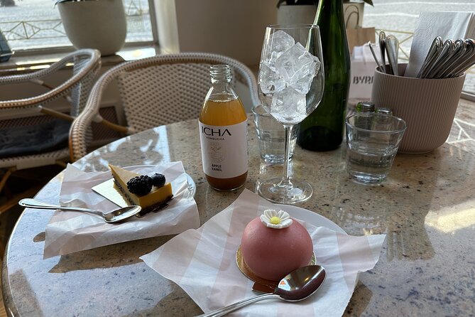 Stockholm Small Group Food Tour with 7 Classic Food Tastings - Hotorget: flowers, neighborhood change, and more food stops